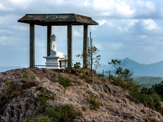 buddha statue in rosa thiruwana top