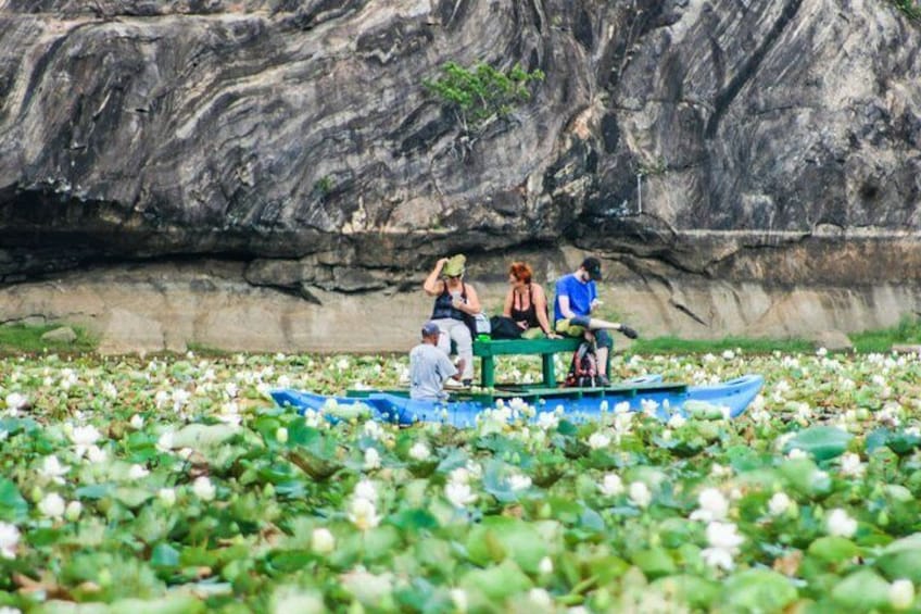 traditional catamaran rides in a lake