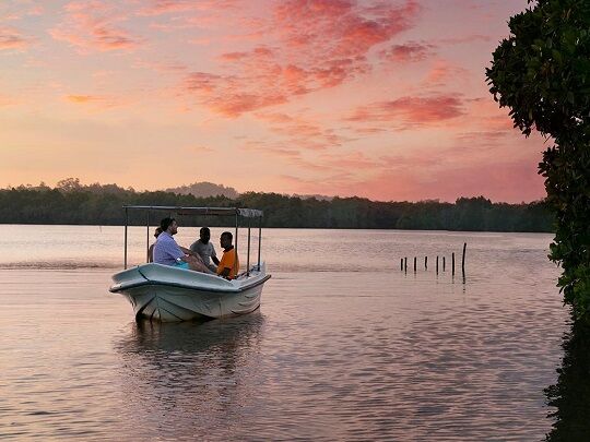 koggala lake boat riding evening time photo